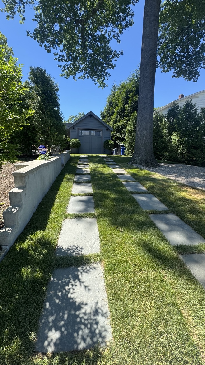 Stone walkway with grass joints